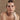 Costa Grande Gold Shell Puffy Earrings by Georgie Quinn on model